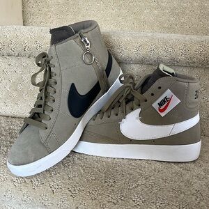 Nike Hi-Tops. W Size 7. Khaki/Olive + black swoosh. Front designed on bias.